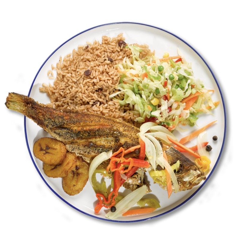 Escovitch Fish plate with rice and peas, cabbage slaw, and fried plantain